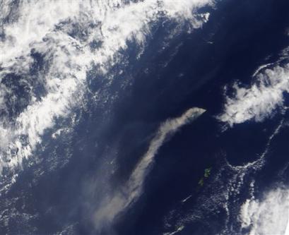 This image released by NASA Tuesday April 5, 2005 a thick cloud of ash erupts from the Anatahan Volcano in this Moderate Resolution Imaging Spectroradiometer (MODIS) image collected on April 5, 2005. According to the Washington Volcanic Ash Advisory Center, a series of low-level eruptions starting on April 4 have created this plume. The Anatahan Volcano erupted again Wednesday morning, shooting a thick plume of ash 50,000 feet into the air and darkening the skies over this tiny U.S. territory in the Pacific. (AP Photo/NASA) 