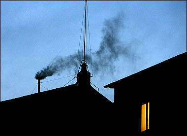Black smoke rises from the chimney of the Sistine Chapel meaning that cardinals failed to elect a new pope in the first ballot of their secret conclave at the Vatican City.(AFP