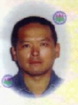 A Japanese passport photo, which bears the name Akihiko Saito, is seen on the Army of Ansar al-Sunna website May 9, 2005. The Islamic militant group said it had abducted the Japanese national working at a U.S. base in Iraq, according to a statement posted on the internet. Photo by Kyodo/Reuters