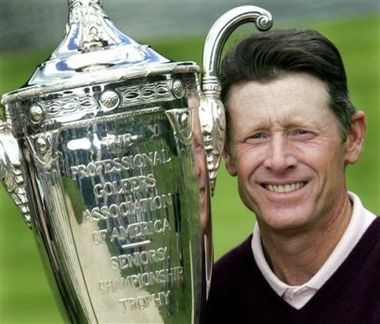 Mike Reid, of Provo, Utah, poses after winning the 66th Senior PGA Championship at Laurel Valley Golf Club in Ligonier, Pa., Sunday, May 29, 2005. Reid forced a three-way playoff with an eagle on the eighteenth hole of regulation. He won on the playoff on the first hole.(AP 