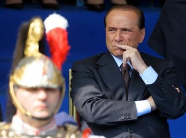 Italian Premier Silvio Berlusconi looks on during the Republic Day military parade, in Rome, Thursday, June 2 2005, 59 years after the Italian Republic was founded. (AP