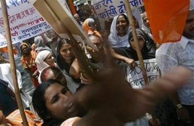 Muslim protesters raise slogans at an anti-U.S. demonstration near the American Embassy in New Delhi, India, Thursday, June 2, 2005. More than 200 Muslim supporters belonging to the minority wing of Hindu nationalist Bharatiya Janata Party staged a protest march on Thursday, demanding an apology from the Bush administration for the alleged Quran abuse by American interrogators at Guantanamo Bay prison in Cuba. (AP