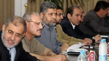 Hamas official Khalel Nofal (3rd L) sits during a meeting between all Palestinian factions and President Mahmoud Abbas (not in picture) in Gaza June 9, 2005. Palestinian President Mahmoud Abbas and Israeli Prime Minister Ariel Sharon are expected to hold their second summit to discuss coordination on an Israeli evacuation in August of all 21 Jewish settlements in Gaza and four of 120 in the West Bank. Photo by Suhaib Salem/Reuters
