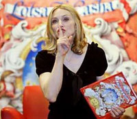 Madonna's message: money can't buy happiness 