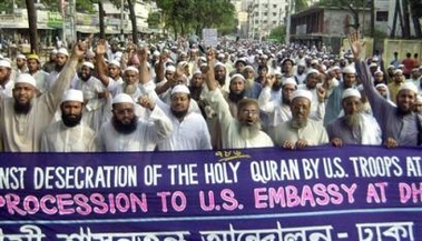 Members of Bangladesh Islami Shasantantra Andalon, or Islamic Constitutional Movement, shout anti-U.S. slogans during a protest in Dhaka, Bangladesh, Saturday, June 11, 2005. Hundreds of Muslims marched towards the U.S. embassy to protest against the alleged desecration of the holy Quran by U.S. soldiers at Guantanamo Bay. (AP