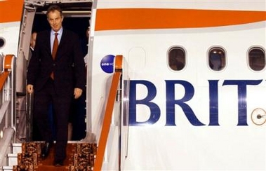 Britain's Prime Minister Tony Blair arrives in Moscow Sunday June 12, 2005, for talks with Russian President Vladimir Putin, launching a final push for agreement on his G-8 priorities of tackling climate change and poverty in Africa. (AP