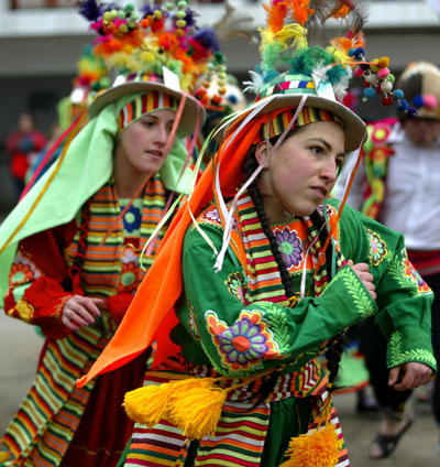 Chileans dance in traditional costumes 