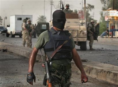 Suicide bombings in Iraqi cities kill 26