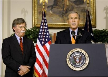 President Bush stands with John Bolton, left, as he announces Bolton's installation as United States ambassador to the United Nations Monday, Aug. 1, 2005 in Washington, D.C.