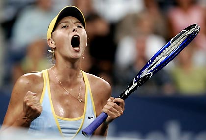 Maria Sharapova of Russia celebrates a point against Eleni Daniilidou of Greece during their match at the U.S. Open tennis tournament in Flushing Meadows, New York, August 29, 2005. [Reuters]
