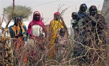 Internally displaced Sudanese women in the Kutum refugee camp in southern Darfur in this picture taken June 3, 2005. [Reuters/file]