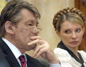 Former Ukraine Prime Minister Yulia Tymoshenko, who came to symbolize Ukraine's Orange Revolution with her fiery speeches and chic style, signaled in an emotional, televised address Friday that she is moving into the opposition to President Viktor Yushchenko, her comrade in arms in last year's uprising. 