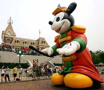 A float featuring Mickey Mouse is seen during the "Disney on Parade" show for guests at Hong Kong Disneyland September 11, 2005, a day before its official opening. [Reuters]