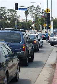 Cars are lined up at a inoperative traffic signal at an intersection in the Studio City section of Los Angeles as a power black out interrupted electrical service to many parts of the city September 12, 2005. Officials at the Los Angeles Department of Water and Power indicated one of their employees accidentally cut a power cable which lead to major power outage knocking out electricity to thousands of customers. 