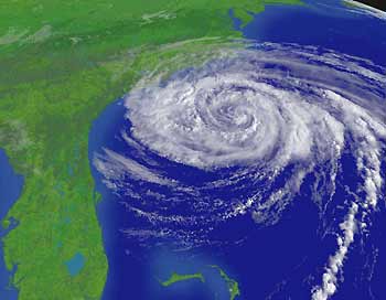 A NOAA satellite image of Hurricane Ophelia taken at 9:45 a.m. EDT on September 12, 2005 shows the storm continuing to hover near the southeastern coast of the US. The center of Ophelia, the first hurricane to threaten the US since Katrina devastated the US Gulf Coast two weeks ago, was about 275 miles (440 km) south-southwest of Cape Hatteras, North Carolina, at 8 a.m. EDT. [Reuters]