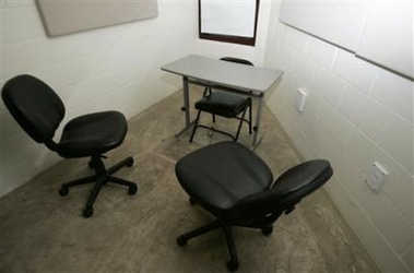 In this image reviewed by the U.S. military before transmission, a detainee interrogation room in Camp V is shown, Saturday, June 25, 2005 at Guantanamo Bay Naval Base, Cuba.