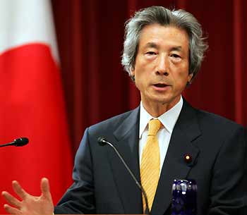 Japanese Prime Minister Junichiro Koizumi speaks during a news conference at the prime minister's official residence in Tokyo September 21, 2005. A special session of Japan's parliament confirmed Koizumi as prime minister on Wednesday, clearing the way for him to press on with a reform programme including privatisation of the postal system after his party's landslide election victory this month. [Reuters]
