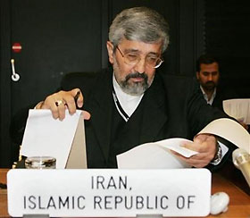 Iran's Ambassador to the International Atomic Energy Agency (IAEA) Ali Asghar Soltanieh reads some notes before an IAEA board of governors meeting in Vienna September 22, 2005. 