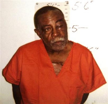 Robert Davis, who was repeatedly punched by two police officers during his arrest is shown in a mug shot released by the police in New Orleans Sunday afternoon Oct. 9, 2005.
