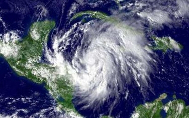 NOAA satellite image of Hurricane Wilma taken at 3:45 p.m. EDT on October 18, 2005, as the storm continues brewing into a stronger hurricane in the northwestern Caribbean Sea.