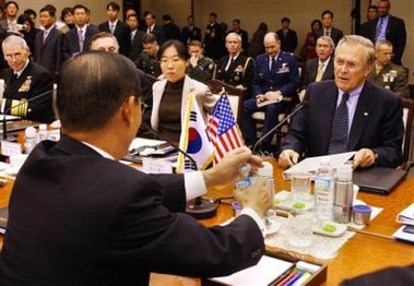 US Secretary of Defense Donald Rumsfeld, right, talks with South Korea's Defense Minister Yoon Kwang-Ung at the start of the 37th Security Consultative Meeting with at the Ministry of Defense on Friday, Oct. 21, 2005 in Seoul.