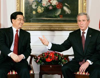 Chinese President Hu Jintao told President Bush Tuesday that China was willing to work with the United States to ease a growing trade imbalance and acknowledged there were frictions in the economic relationship, the Reuters reported.