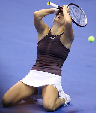 Mauresmo of France celebrates as she defeats compatriot Mary Pierce during the final of the WTA Tour Championships in Los Angeles November 13, 2005.
