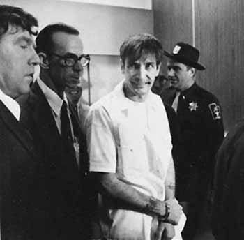 Gary Mark Gilmore arrives heavily guarded to 4th District Court in Provo, Utah on Wednesday, Dec. 1, 1976.