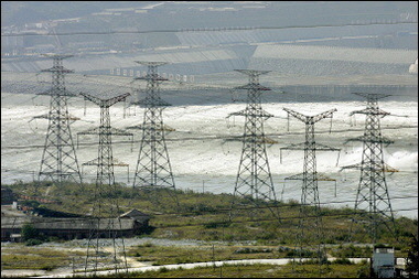 Power grids along the Yangtze River at the Three Gorges dam in China.