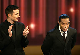 MRonaldinho of Brazil (R) and Frank lampard of England wait for their trophy during the FIFA World Player 2005 awards ceremony in Zurich, Switzerland, December 19, 2005.