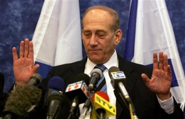 Israeli acting Prime Minister Ehud Olmert gestures during a press conference in Jerusalem Sunday Jan. 8, 2006. 