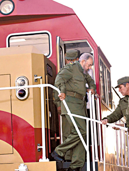 Cuban President Fidel Castro on Saturday steps down from one of 12 diesel locomotives that arrived in Havana by ship from China a week earlier. China became Cuba's second-largest trading partner after Venezuela in 2005 exports to Cuba grew 95 per cent in the first 10 months of 2005 to over US$500 million, while imports rose 17 per cent to US$200 million, according to Yang Shidi, China's commercial counsellor in Havana. [Reuters]