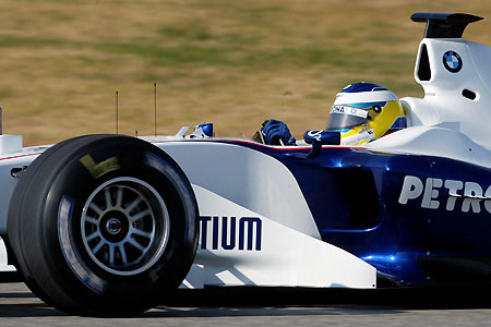 Germany's Nick Heidfeld drives the new BMW-Sauber F1.06 car at the Ricardo Tormo racetrack in Cheste, near Valencia eastern Spain, January 17, 2006. The new BMW-Sauber Formula One team presented their first car on Tuesday with the aim of winning races within three years. [Reuters]