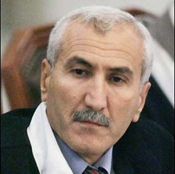 Rizgar Mohammed Amin, the former presiding judge of a five-judge tribunal overseeing the Saddam case, conducts the trial held under tight security in Baghdad's heavily fortified Green Zone in Iraq, October 2005.