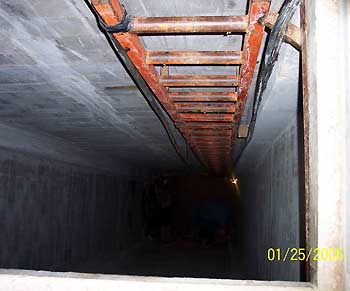 The entrance to a cross-border tunnel in the Otay Mesa area of San Diego County, California is shown in this handout photo provided by the U.S. Drug Enforcement Agency January 26, 2006. The tunnel began in a warehouse in Tijuana, Mexico and is said to have electricity and a ventilation system, and exits in a vacant industrial building in Otay Mesa