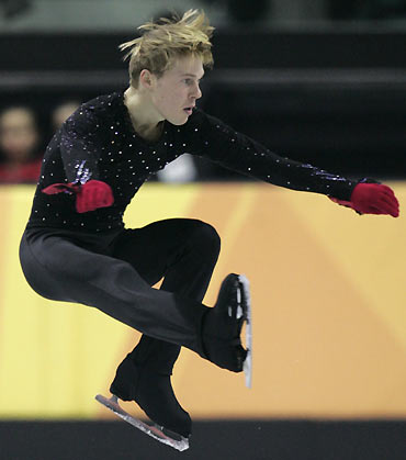 Anton Kovalevski from Ukraine performs during the figure skating men's Short Program at the Torino 2006 Winter Olympic Games in Turin, Italy February 14, 2006. [Reuters]