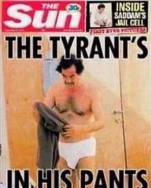 Sun prints Saddam photos, blasts critics