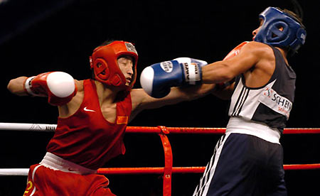 Zou wins China's first world boxing title