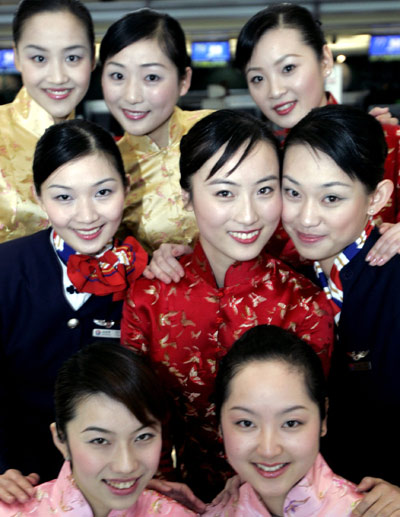 Serving Taiwan passengers in traditional attire