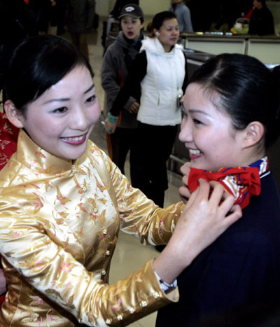 Serving Taiwan passengers in traditional attire