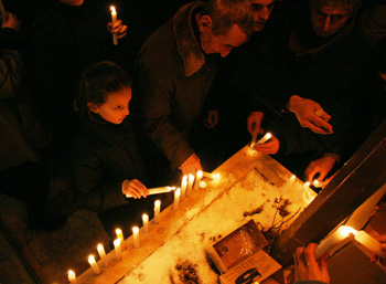 Kosova citizens mourn the death of their president