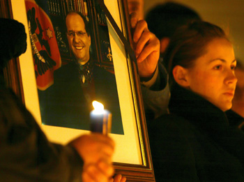 Kosova citizens mourn the death of their president