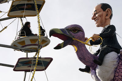 Carnival float depicting Italian PM Berlusconi