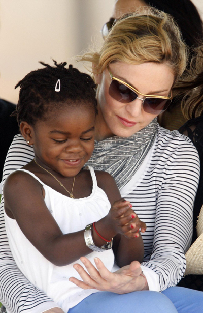 Madonna and her adopted child at site of her Raising Malawi Girls Academy