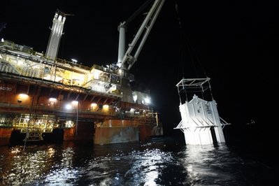 AP: Giant box lowered in Gulf to battle oil spill