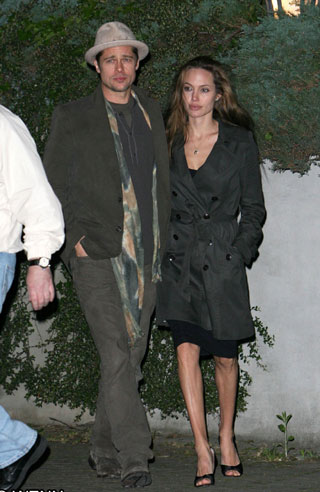 Angelina Jolie and Brad Pitt leaving a restaurant