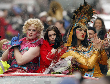 Anne Hathaway is all smiles during the Hasty Pudding Woman of the Year Parade