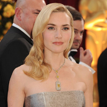 Kate Winslet supported by Leonardo