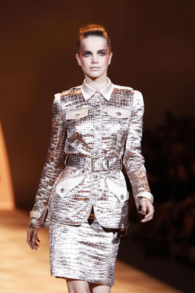 Models present creations from the Christian Siriano Spring 2011 collection during New York Fashion Week