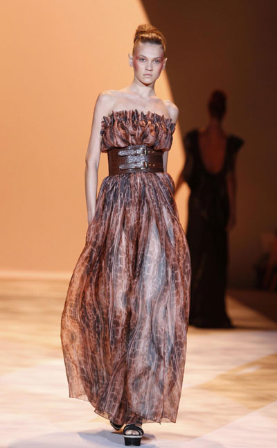 Models present creations from the Christian Siriano Spring 2011 collection during New York Fashion Week